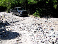 I took my truck down South Castle Road as far as I could go and even removed large rocks from the center to avoid damaging the vehicle's undercarriage, but eventually it got too narrow and rough.