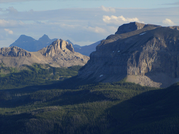 The dark peaks in the distance are Kinnerly and Kintla in Montana. Font Mountain is the interesting peak below them with the closest being Mount Matkin on the right.