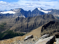 Ipasha Peak, Mount Merritt, and Mount Cleveland tower above Ptarmigan Wall. Cleveland is Glacier National Park's highest mountain.