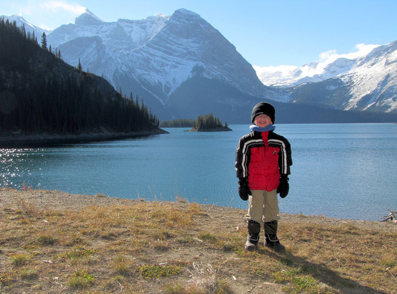 Riley looking exceptionally happy despite the cold October temperatures. Behind him are Upper Kananaskis Lake and Mount Sarrail.