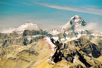 Eon Mountain and Mount Assiniboine tower over Red Man Mountain.