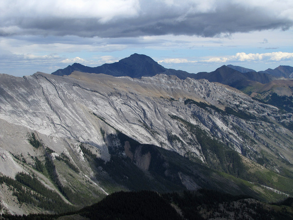 Mount Costigan (tall one in shadow) is one of the higher peaks in the area and seldom climbed as it is quite remote.