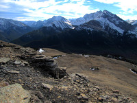 I believe the mountain left of center is The Ripsaw and to the right is Mount Denny in the Opal Range.