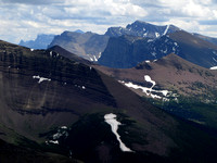 The three farthest peaks (left to right) are Mount Cleveland in Montana's Glacier Park, Mount Blakiston, and Anderson Peak which are in Waterton National Park.