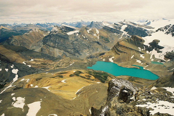 This is a view of the colorful Caldron Lake basin from just southeast of the true summit.