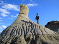 This is one of the most noticeable formations in Dinosaur Provincial Park. Riley gives it some scale.