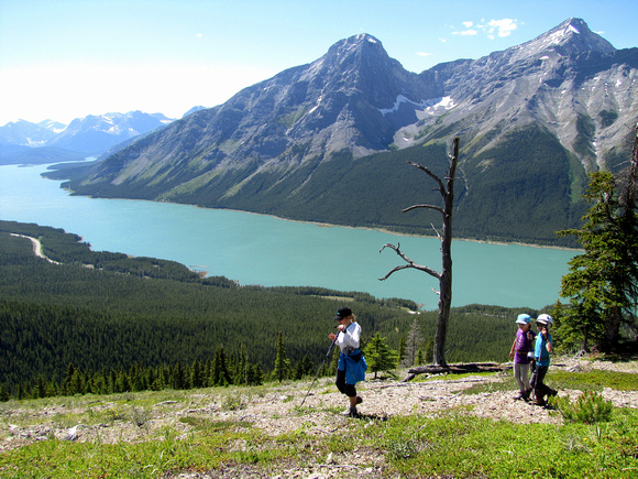 My sister Keri walks along Read's Ridge with Amy and Riley in behind. Mount Nestor towers above Spray Lake.