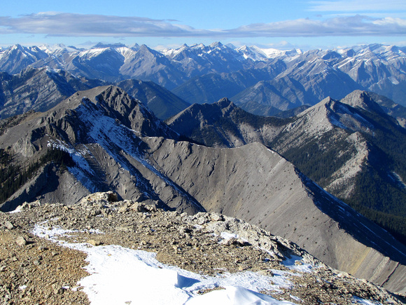 To the north is a sea of peaks with the more notable ones being pointy Mount Fable (left of center) and nearby Midnight peak (below it on the left).