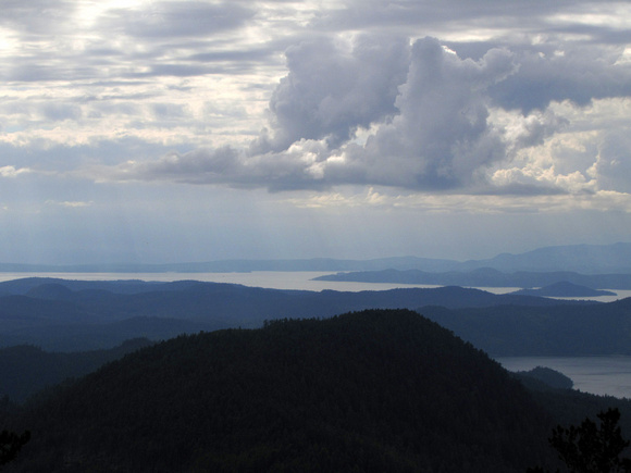 Sun beams add an interesting mood to the Straight of Georgia in this view looking south from Llanover Mountain.